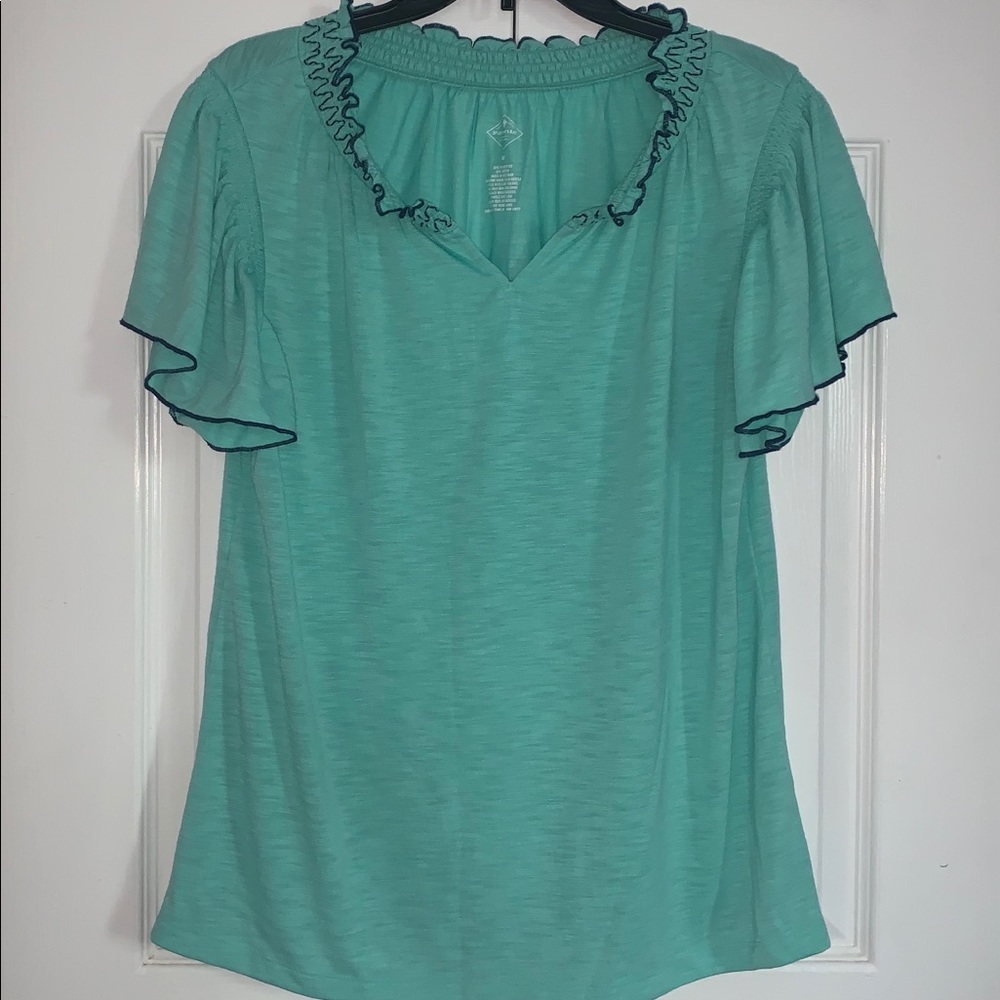 Teal shirt with navy blue hem
